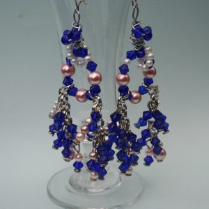 Blue and pink glass beads hang earrings